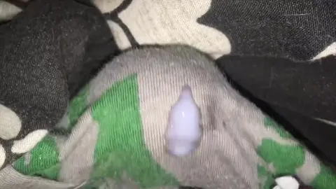 Teenager Has Intense Orgasm in Boxers Under Blanket