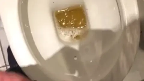Twink Urinates in Explicit Scene