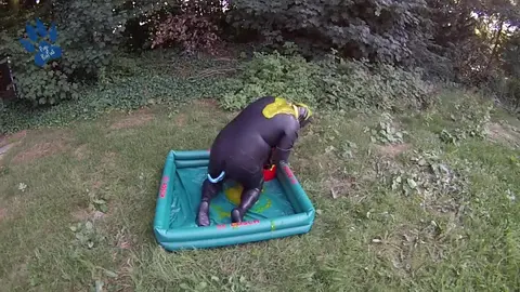 Rubber Puppy Gets Gunged Outdoors