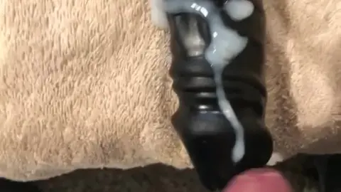 Guy Cums on Large Black Dildo in Solo Play