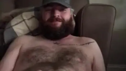 Gay Guy Laughing and Snorting During Funny Moment