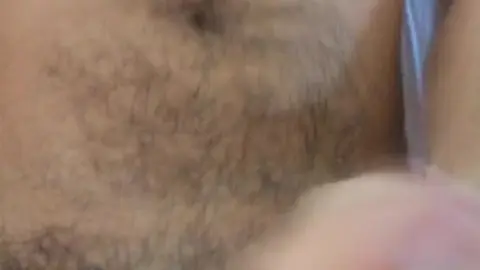 Hairy Guy Gets Hand Job with Cum on Belly