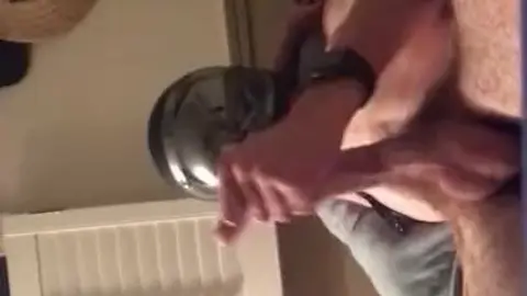 Guy Gets Handjob with Helmet On