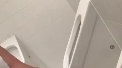 Chinese College Boy Urinates in Public Restroom Cage