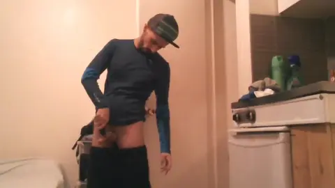 Gay Guy Strokes Cock While Smoking