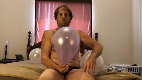 Jock in Jockstrap Plays with Balloons