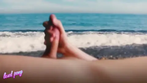 Guy Gives Handjob on Public Beach