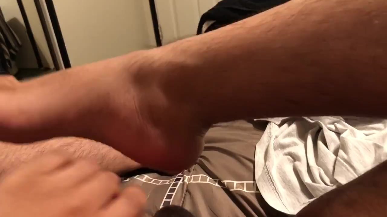 Chubby Guy Gives Self Footjob with Small Dick