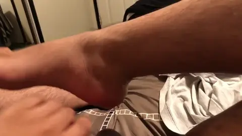 Chubby Guy Gives Self Footjob with Small Dick