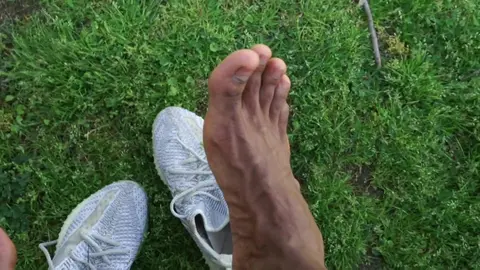 Guy Sits on Car, Shows Off Feet for Turned On Buddy