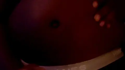 Muscular Men Engage in Creamy Oral Play
