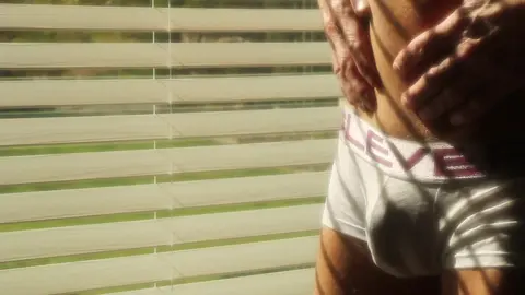 Exhibitionist Masturbates for Voyeuristic Neighbors
