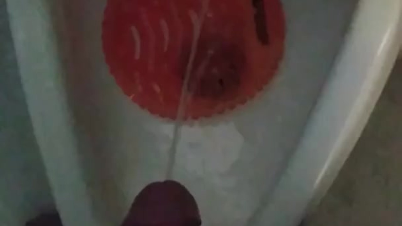 Guy Pisses in Dark Public Restroom