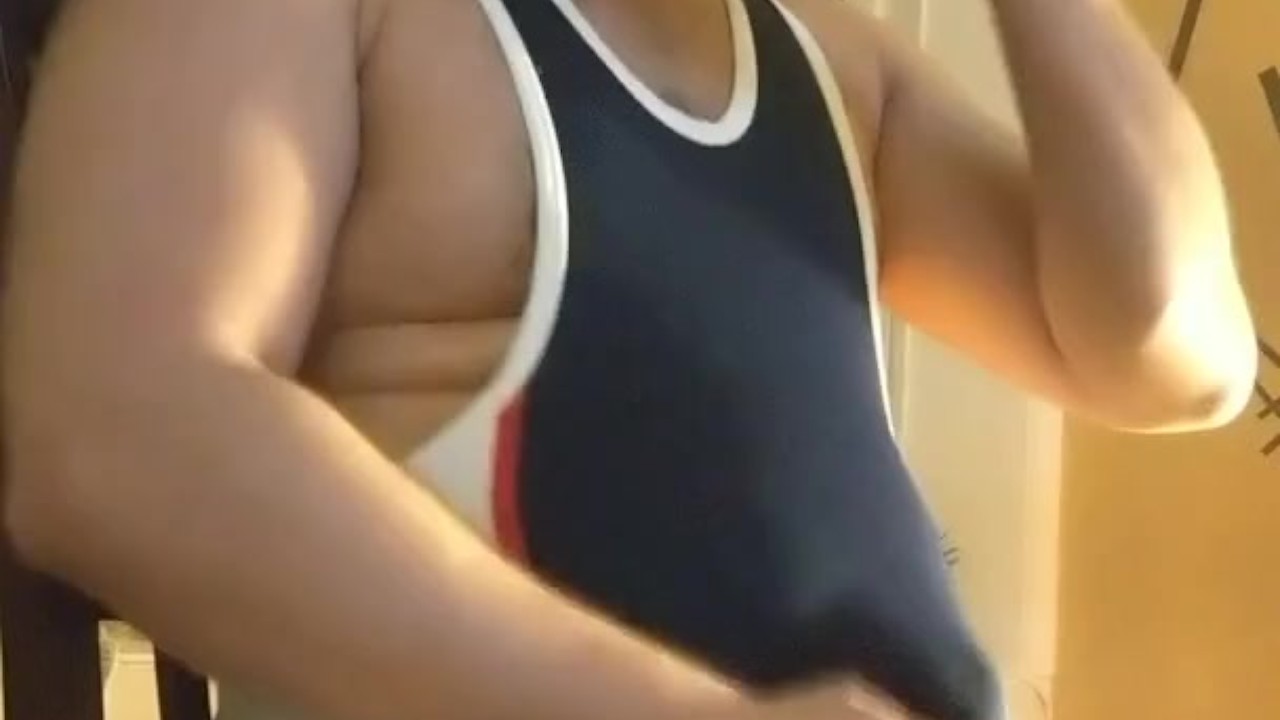 Hunky Wrestler Enjoys Singlet Fun