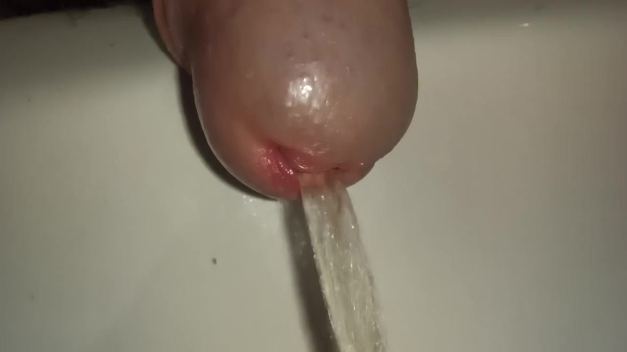 Close Up of Pissing Cock in Extreme Detail