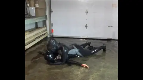 Frogman Dominates Captive Jock in Flooded Lair