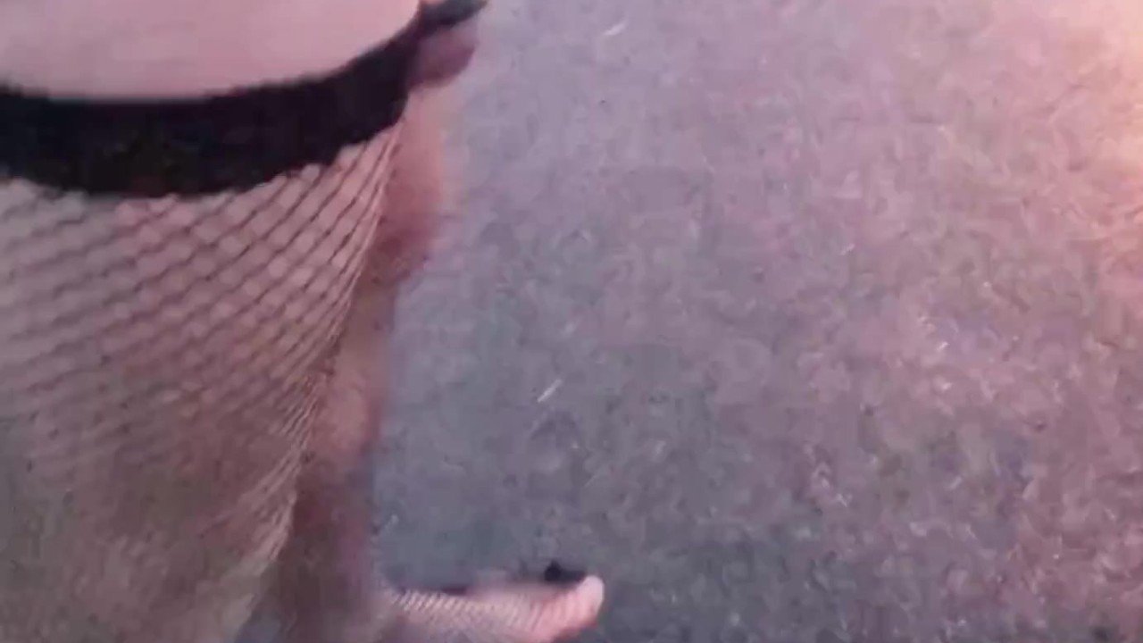 Gay Street Scene with Fishnet Stockings and Ball Weights