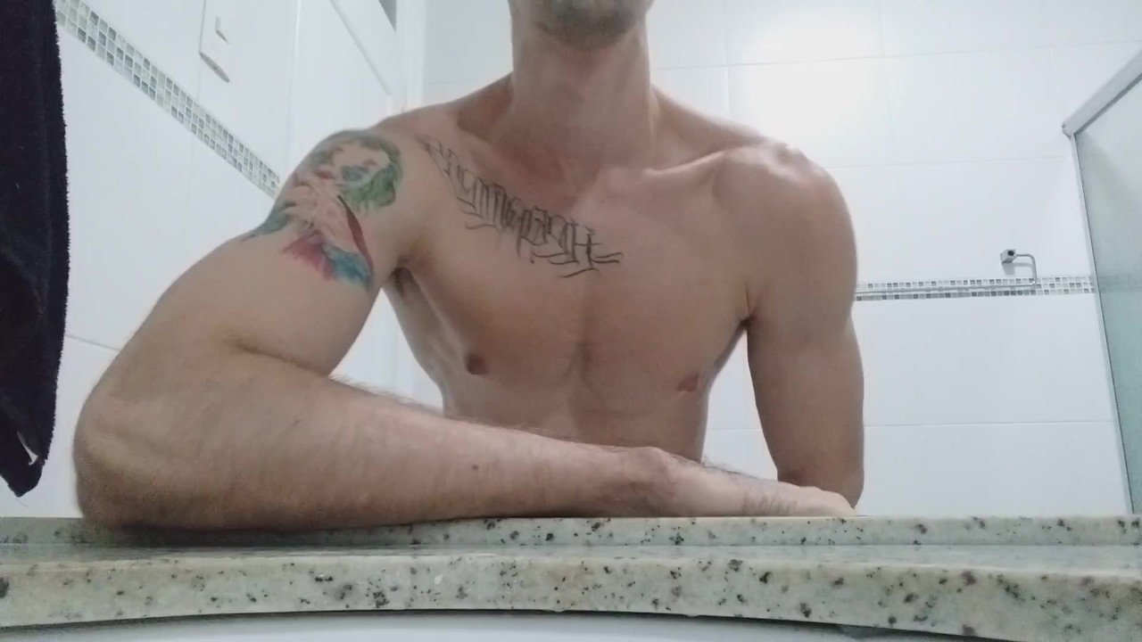 Brazilian Top Jerks Off in Bathroom