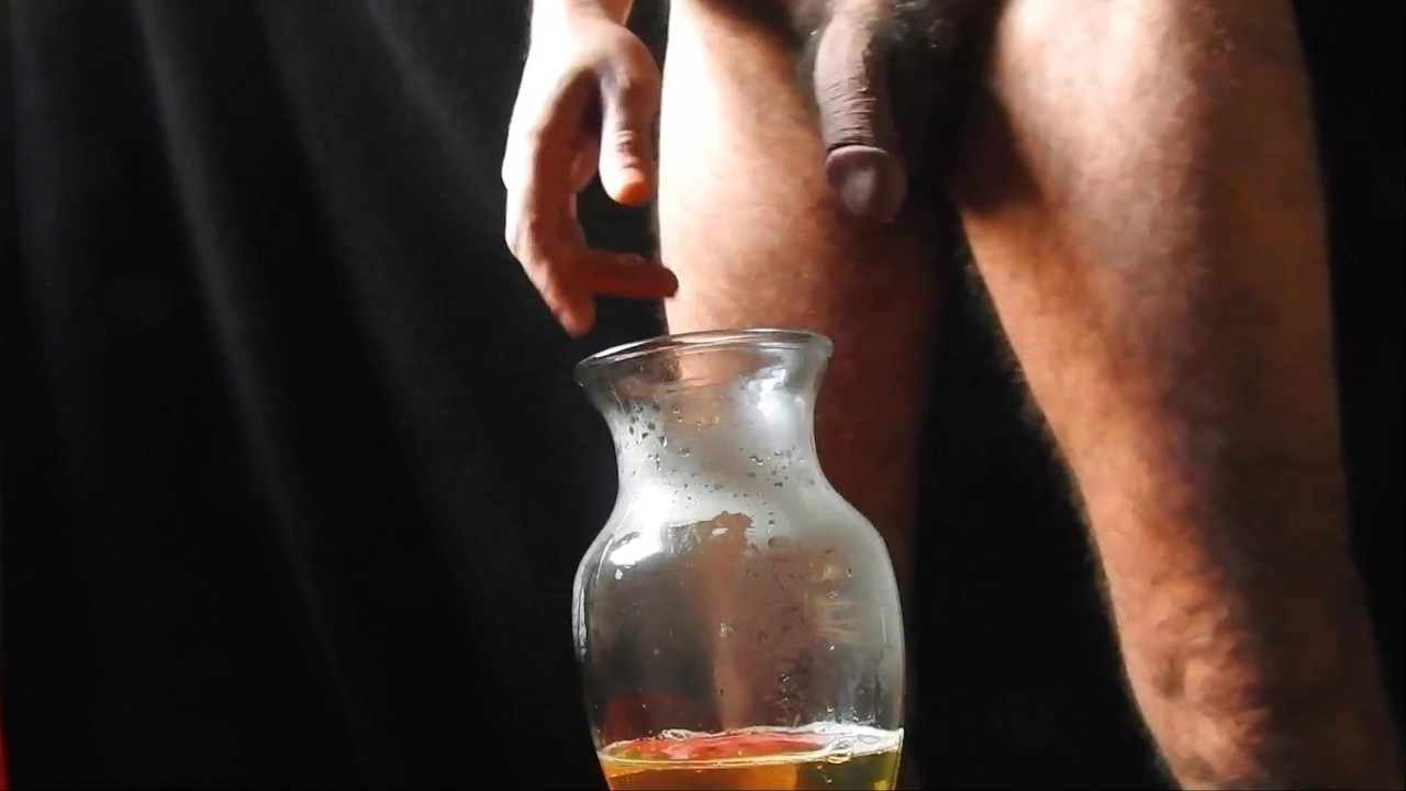 Horny Guy Pisses in a Jug