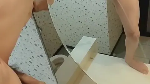 Gay Guy Pisses Hands-Free in Front of Mirror