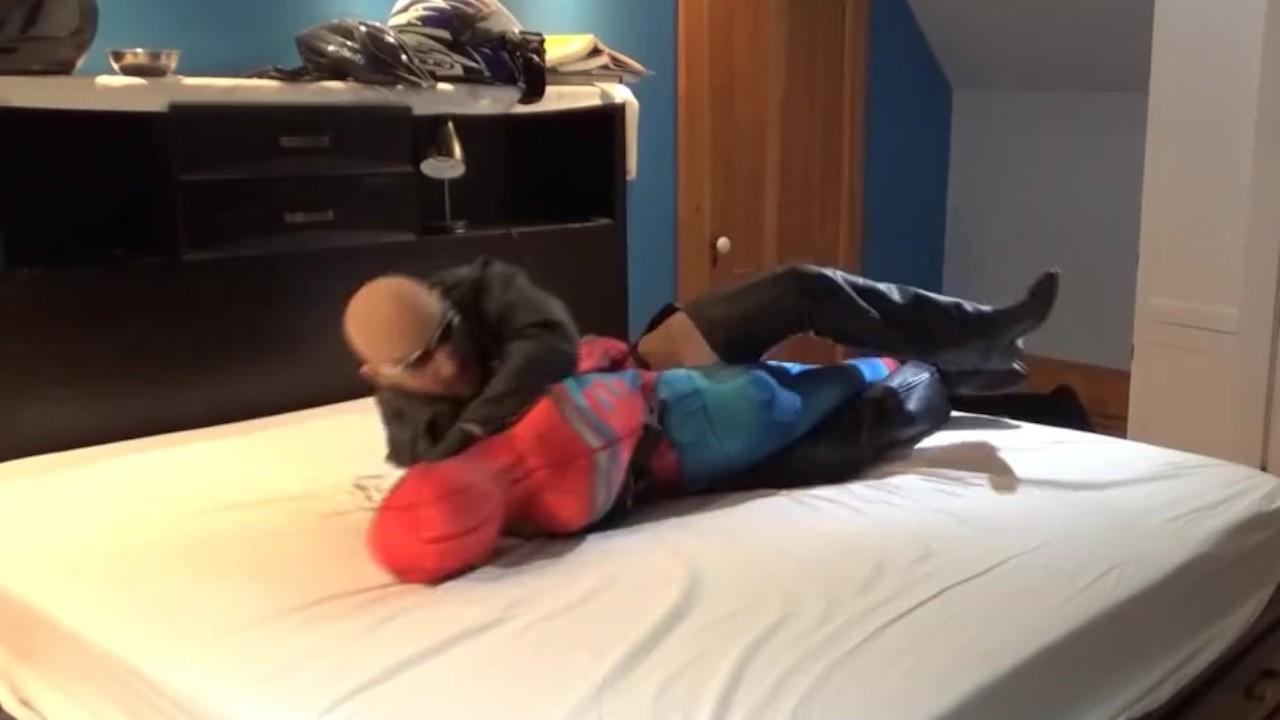Leather Man Facesits Spiderman Dummy and Cums