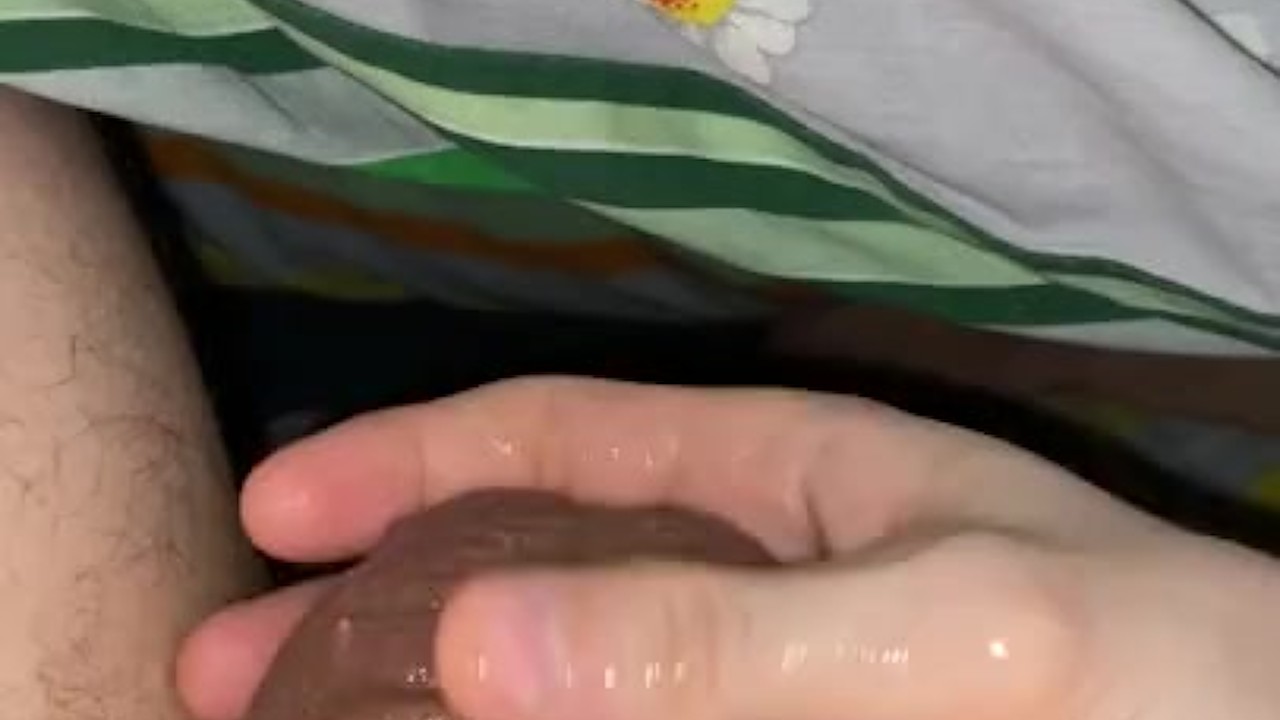 Guy Plays with Own Cum in Solo Scene