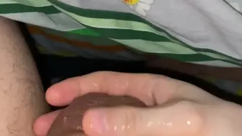 Guy Plays with Own Cum in Solo Scene