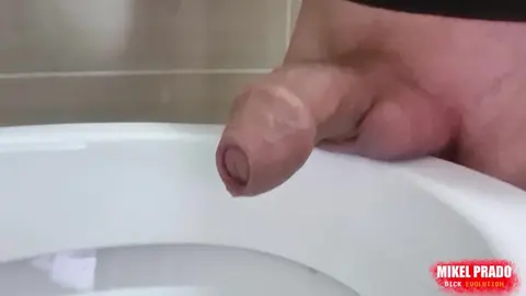Uncut Guy Urinates with Powerful Stream