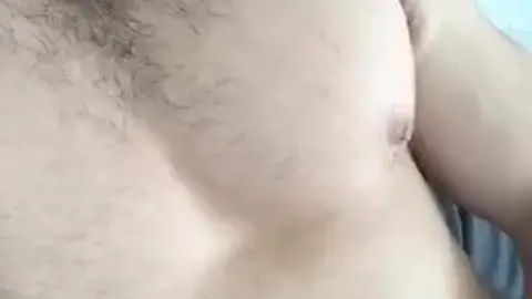 Hairy Jock Shows Off Muscular Chest