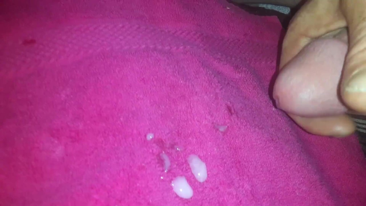 Guy Cums on Pink Rag Held by Female Cleaner