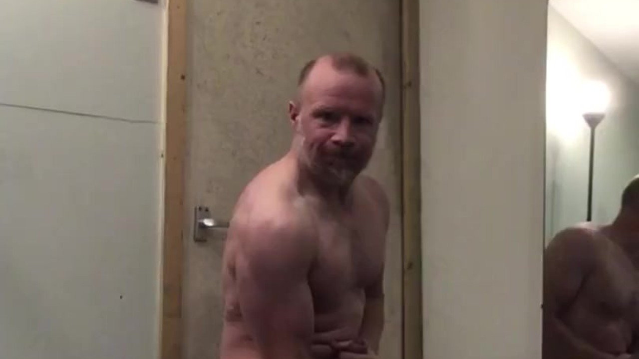 Muscle Guy Jerks Off Huge Cock While Pumping Biceps