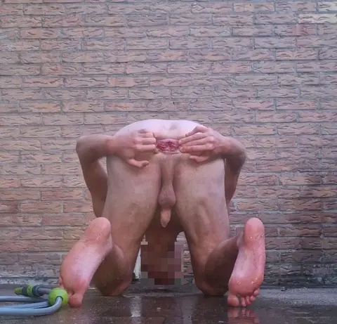 Gay Bottom Uses Water Hose for Anal and Vaginal Play