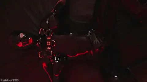 Guy Wears Rubber Mouth and Cock Sheaths for Kinky Play
