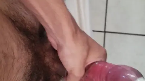 Tight Condom Stretched with Cum