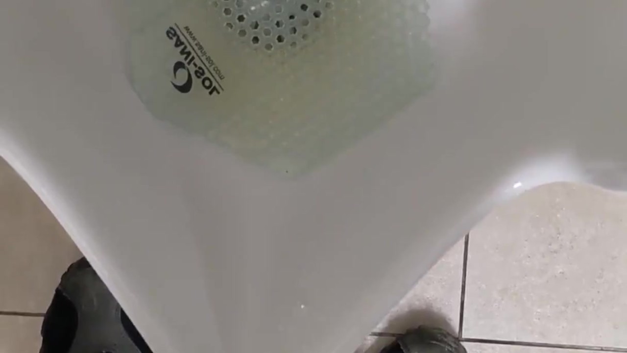 Guy Pisses at Office Desk