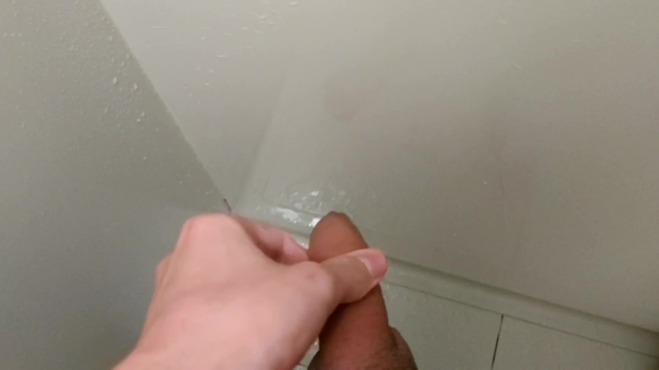 Uncut Guy Marks Wall with Cum