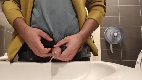 Guy Urinates in Public Toilet Sink