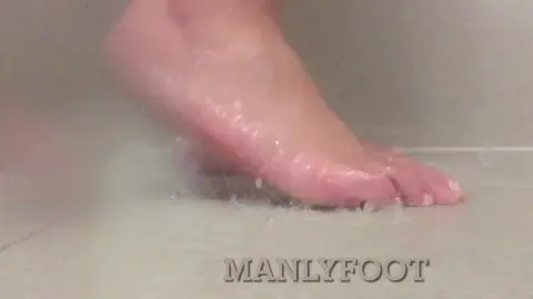Naked Man Shows Off Feet in Hotel Shower
