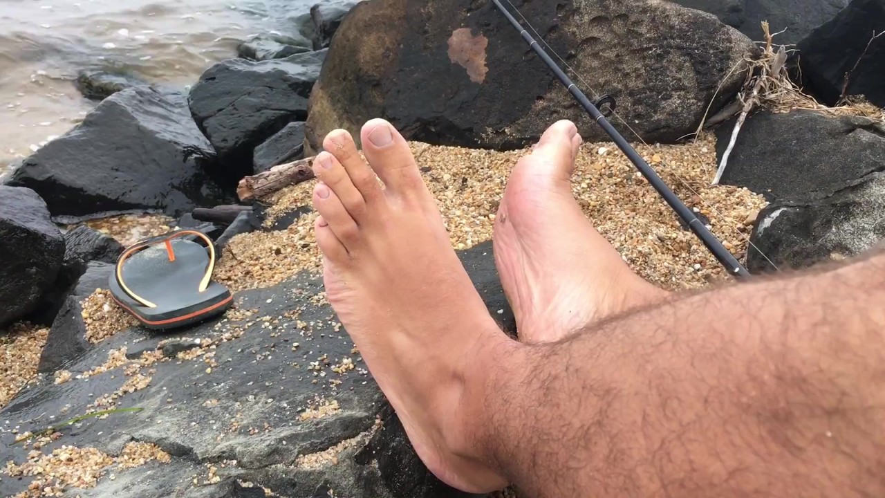 Skinny Dipping Guy Enjoys Sock Sniffing by the Lake