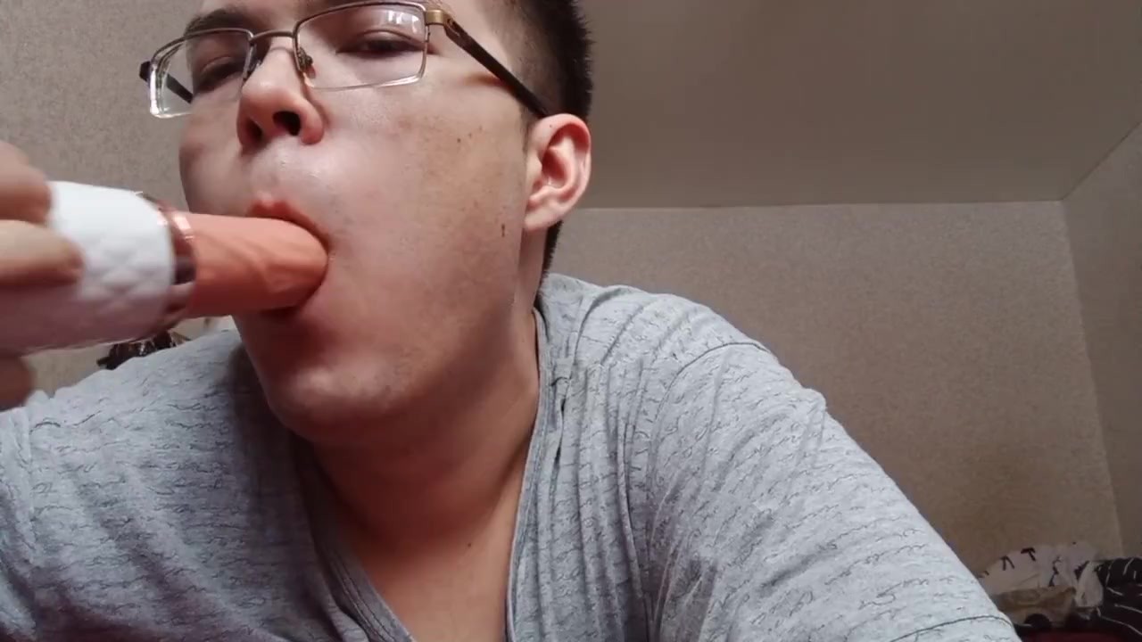 Guy Gives Blowjob with Dildo Play