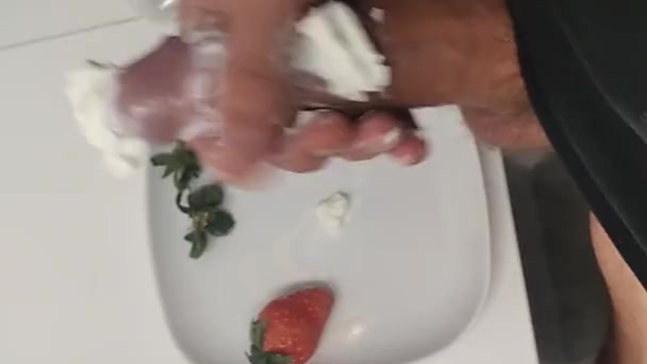 Horny Guy Eats Strawberries and Cream off His Big Cock