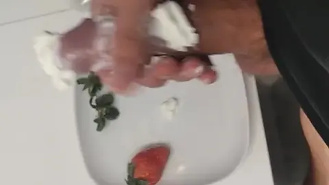 Horny Guy Eats Strawberries and Cream off His Big Cock
