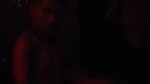 Gay Men Have Sex in Dark Red Room