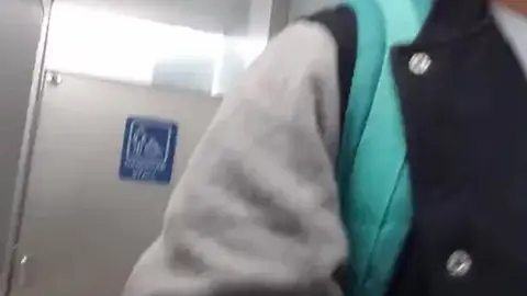 Guy Cums in Airport Bathroom with Pants Down