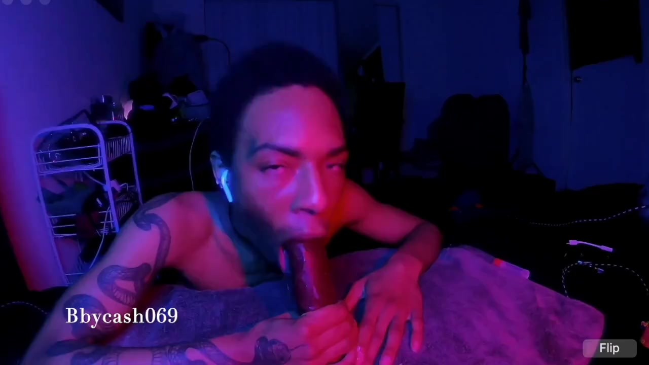 Guy Deepthroats Big Black Cock Toy