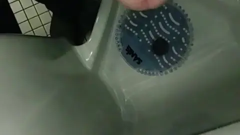 Guy Jerks Off at Urinal and Cums