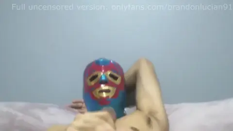 Masked Wrestler Masturbates in Bed Alone