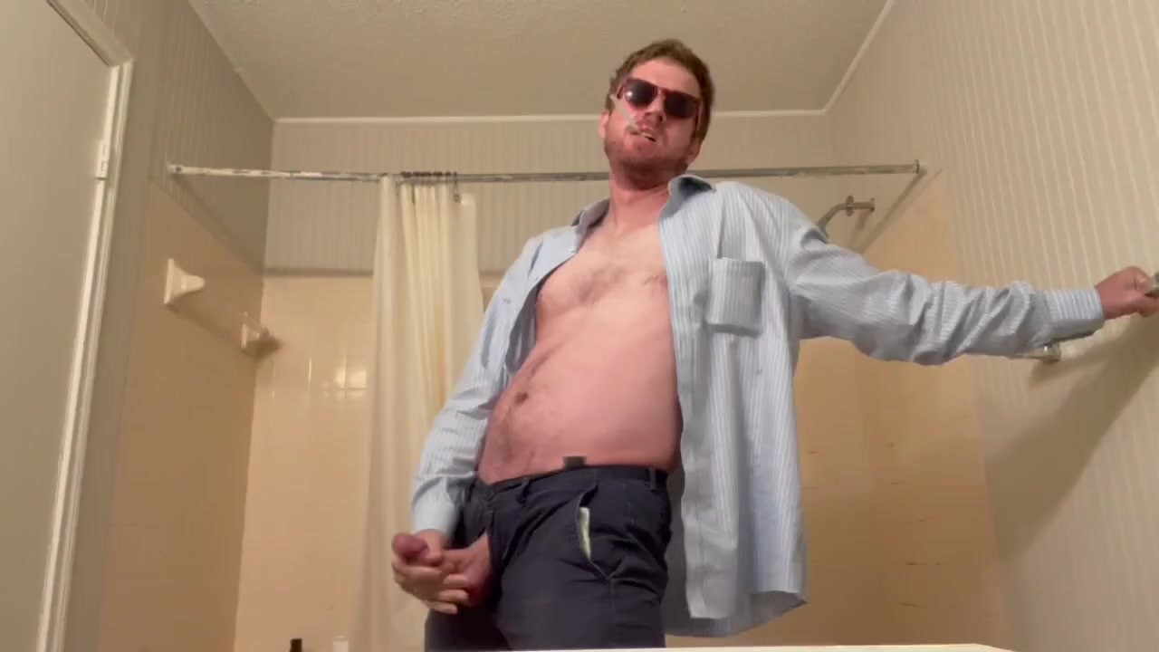 Guy Strokes Dick to Orgasm with Squeezed Testicles