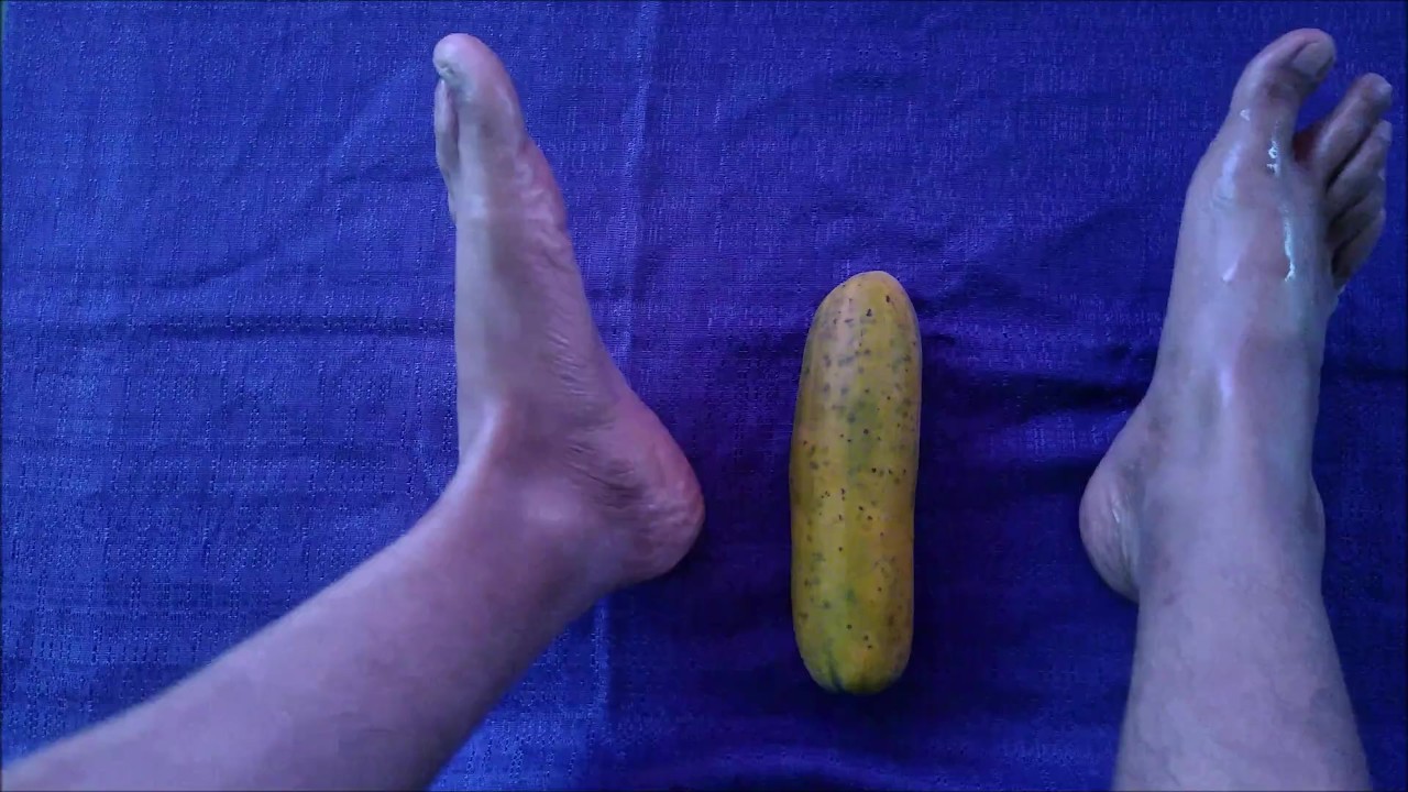 Guy Masturbates with Feet on Cucumber