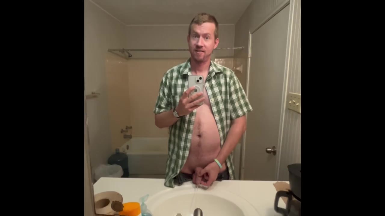 Blonde Guy Urinates in Sink